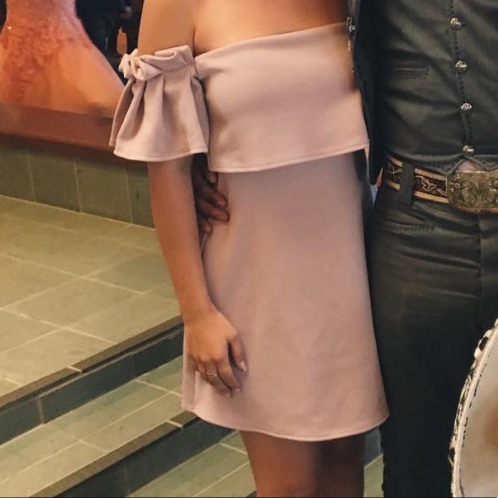 Light purple off the shoulder dress.
